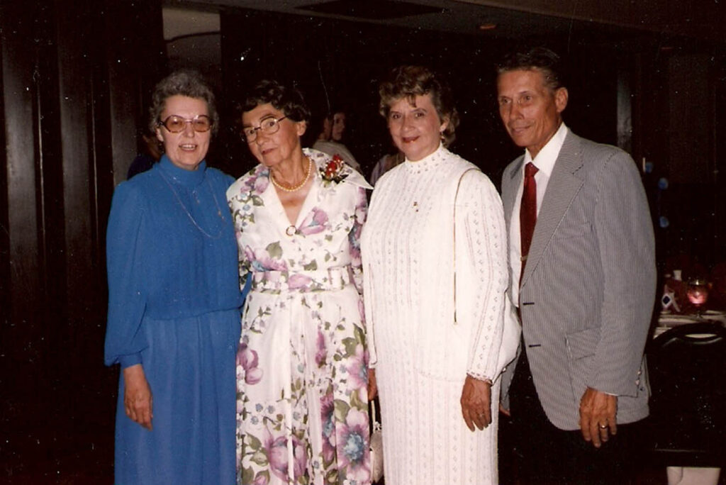(From left) In a 1985 photo, College of Pharmacy alumna Metta Lou Henderson, PhD, stands with mentor and pharmacy research professor Mary Caldwell, PhD, and Myrdas and Willis R. Brewer, PhD, dean of the college from 1952 to 1975.